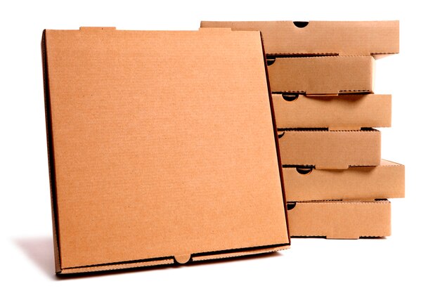 Pilha de caixas de pizza