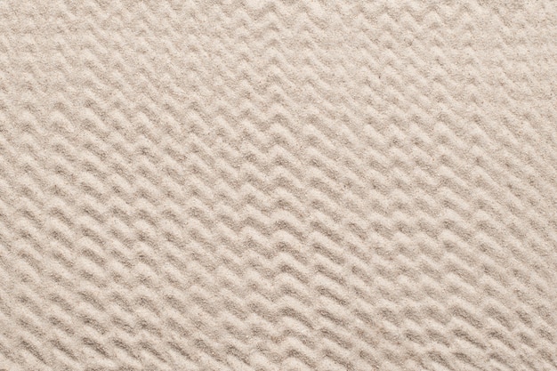 Plano de fundo texturizado de areia com padrão de ziguezague no conceito de bem-estar