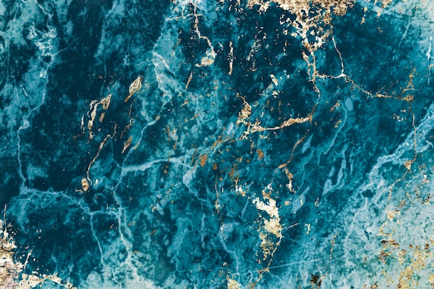 Foto grátis plano de fundo texturizado de mármore azul e dourado