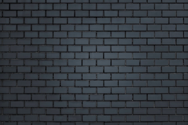 Plano de fundo texturizado de parede de tijolo cinza escuro