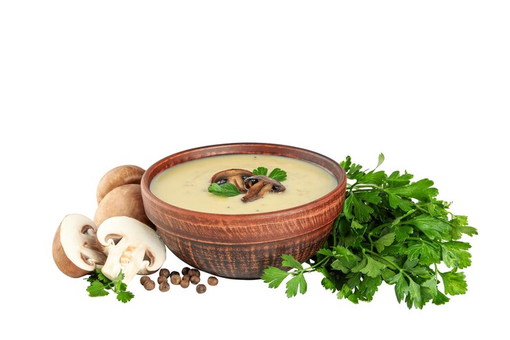Foto grátis png uma tigela de creme de sopa de cogumelos com salsa isolada em fundo branco