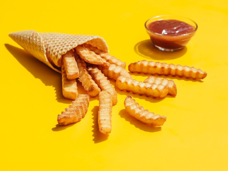 Foto grátis porção de batatas fritas com ketchup
