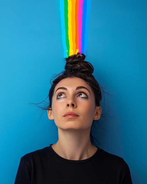 Foto grátis portrait of person with rainbow colors symbolizing thoughts of the adhd brain