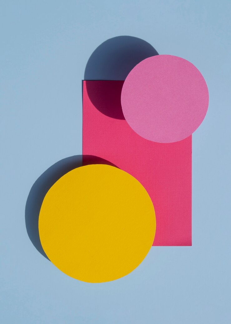 Foto grátis postura plana de design de papel abstrato círculos