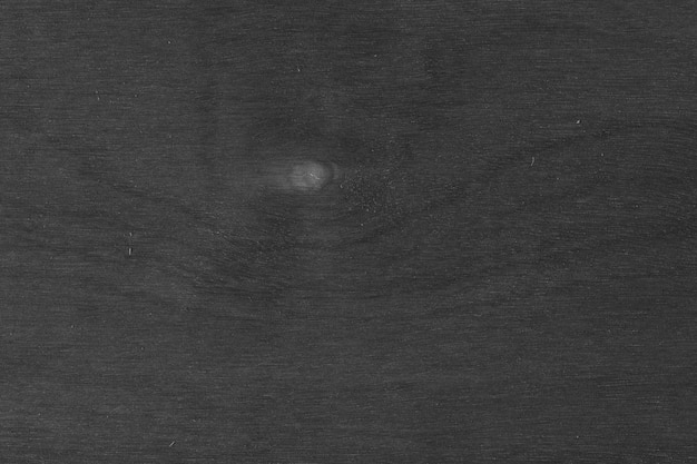 Foto grátis prancha de madeira escura com nó