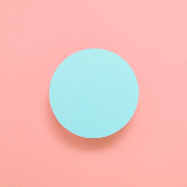 Quadro circular azul em branco sobre fundo colorido