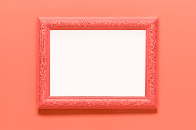 Foto grátis quadro rosa em branco sobre fundo colorido