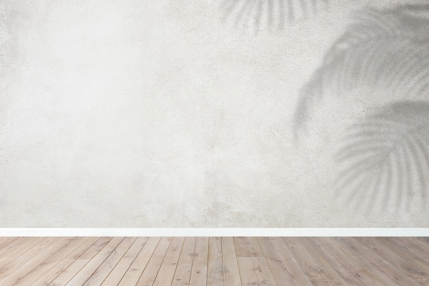 Foto grátis quarto vazio com parede cinza e sombra tropical