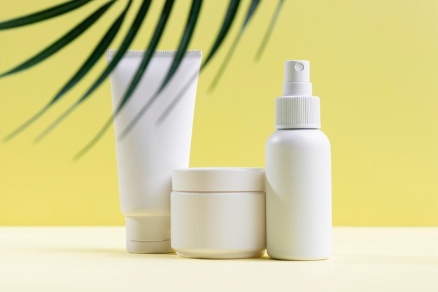 Recipientes de creme de plástico branco