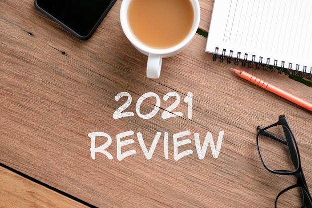 Revisão de 2021, revisão do ano passado na vida, conceito de negócio plano. redação e preparação para as resoluções de ano novo de 2022