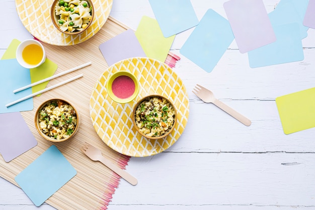 Foto grátis risoto de abóbora para crianças com fundo de comida, com lentilhas verdes