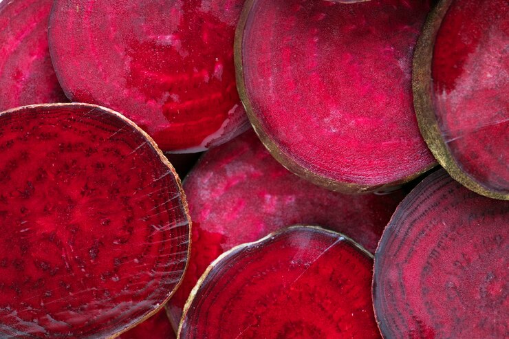 Foto grátis rodada fatias texturizadas de beterraba