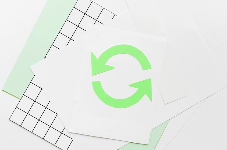 Foto grátis seta fazendo um círculo no papel