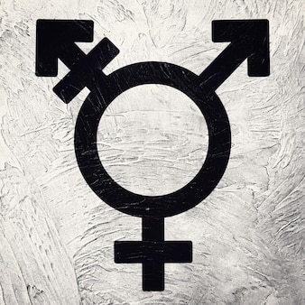 Símbolo transgênero combinando símbolos de gênero. estilo retrô.