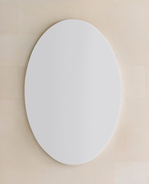 Sinal oval branco em uma maquete de parede
