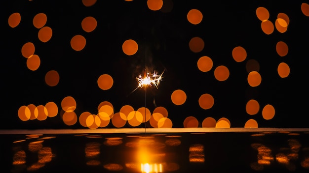 Foto grátis sparkler e pontos de luz