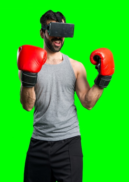 Sportman com luvas de boxe e óculos vr