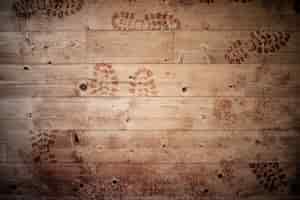 Foto grátis superfície de madeira com pegadas - ótima para plano de fundo ou um blog