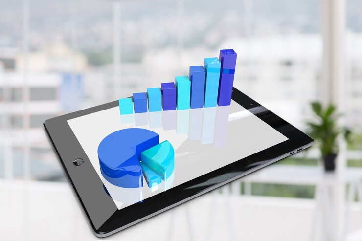 Foto grátis tablet com gráficos em tons azuis