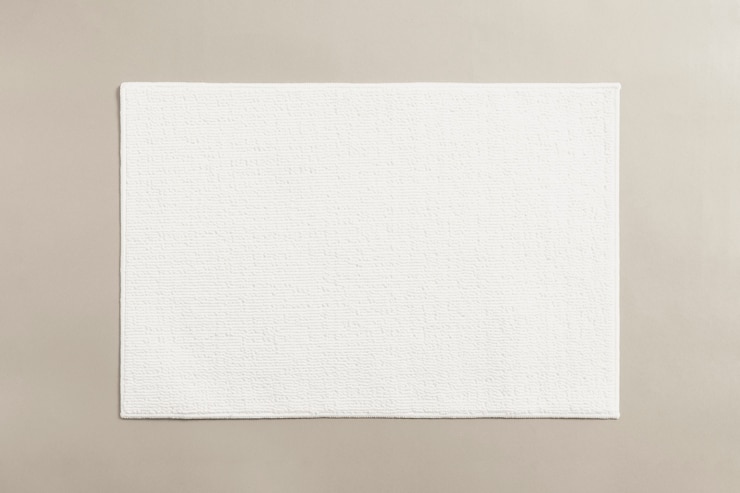 Foto grátis tapete de banheiro de algodão branco no chão