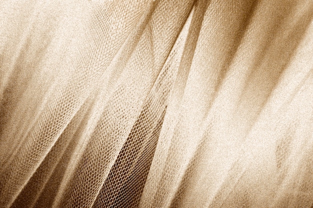 Tecido de seda dourada com textura de pele de cobra