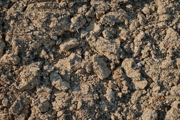 Terra arável de campo arado após a colheita, vista superior, fundo ou ideia de proteção de tela sobre ecologia da terra e erosão do solo Ecoprodutos crescentes