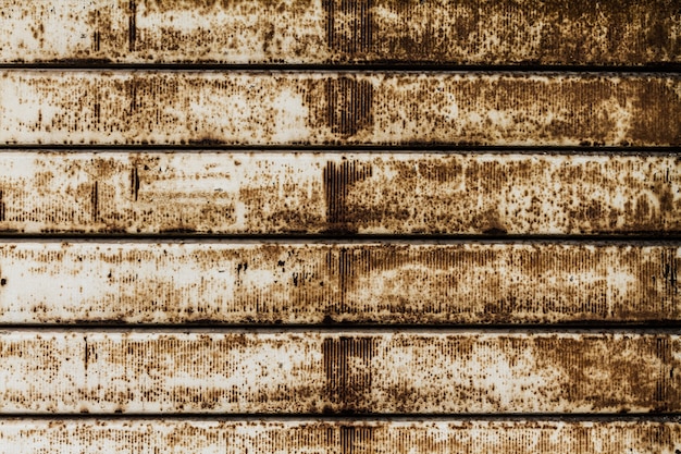 Textura bonita da parede oxidada das listras do Grunge. Horizontal. Padronizar. Fundo Oxidado.