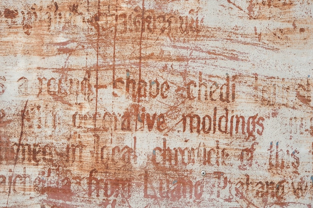 Textura da parede resistido com letras