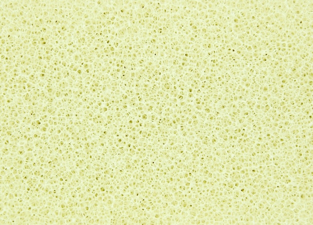 Textura de esponja amarela abstrata para o fundo