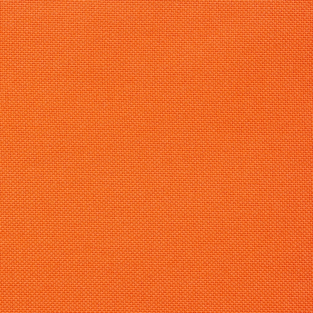 Foto grátis textura de lona laranja sem costura para o fundo