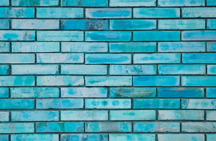 Foto grátis textura de parede de tijolo pintado de azul