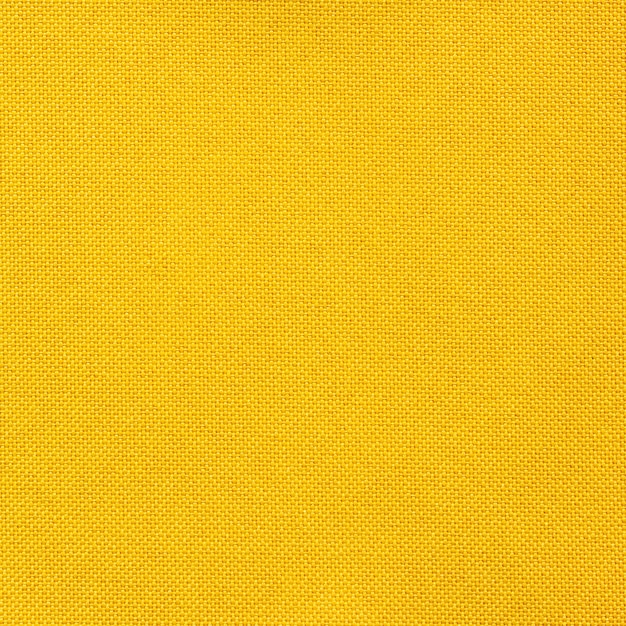 Textura de tecido amarelo sem costura para o fundo