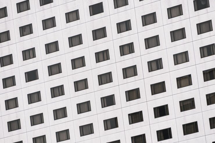 Foto grátis texturas de padrão de janela do edifício