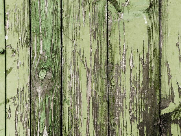 Tinta descascada verde de textura de prancha de madeira
