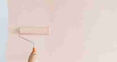 Foto grátis tinta rosa pastel em um modelo de banner de site de parede