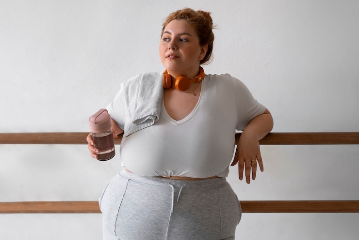 Foto grátis treinamento de dançarina profissional plus size vista frontal