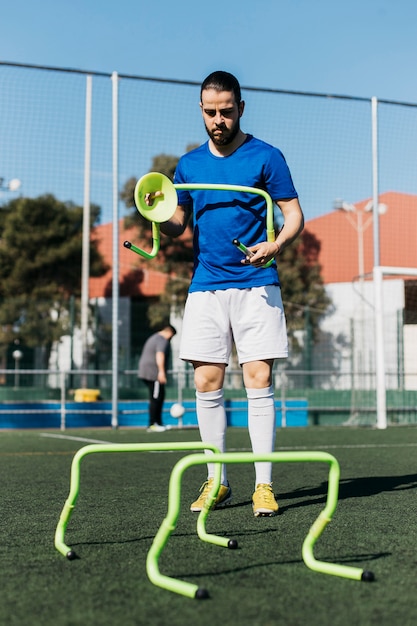 Foto grátis treinamento de jogador de futebol