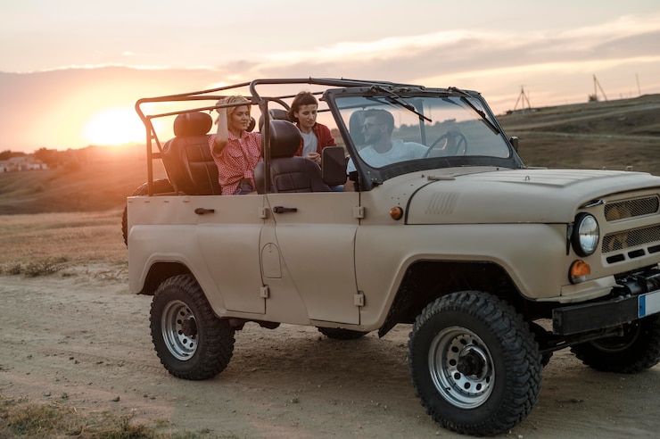 Foto grátis três amigos viajando juntos de carro