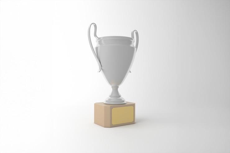 Foto grátis troféu de prata brilhante em uma base de madeira simbolizando realização e sucesso