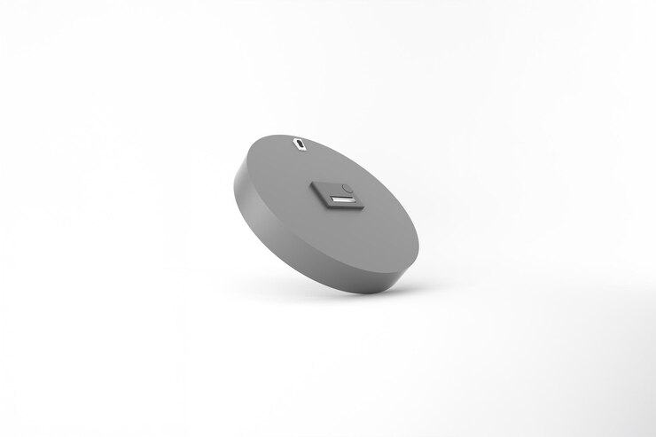 Foto grátis um moderno gadget eletrônico cinza com um design redondo isolado em um fundo branco