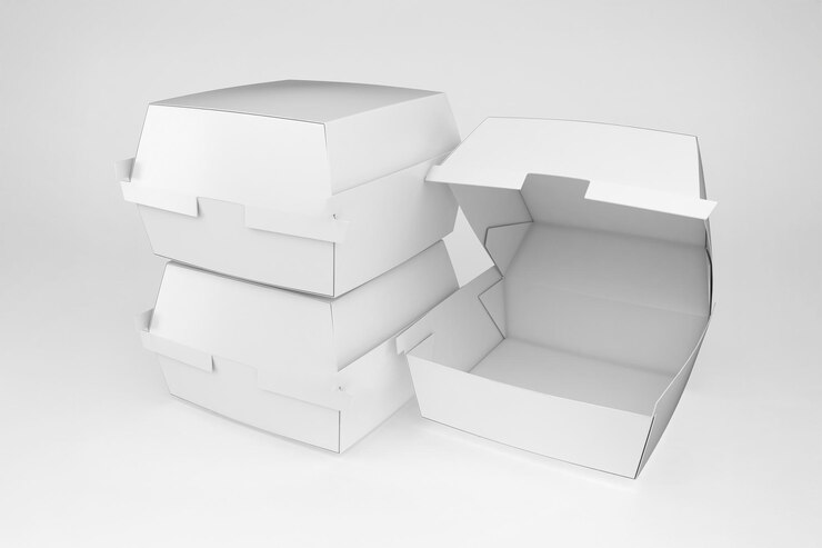 Foto grátis uma pilha de caixas de hambúrguer de papelão branco