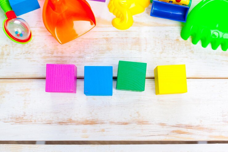 Foto grátis variedade de brinquedos e itens infantis