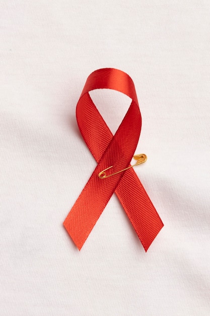 Variedade de conceito do dia mundial da aids com o símbolo da fita