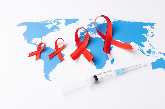 Foto grátis variedade de conceito do dia mundial da aids com o símbolo da fita