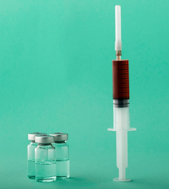 Variedade de frasco de vacina em verde