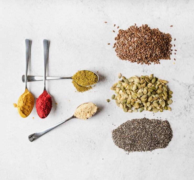 Foto grátis variedade de sementes e alimentos em pó