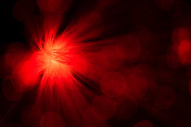 Ventilador abstrato vermelho em fibra óptica