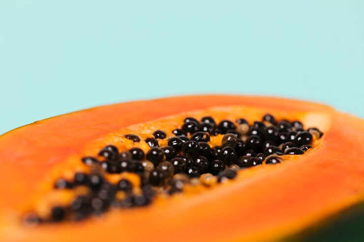 Foto grátis vista dianteira, de, mamão fatiado, fruta