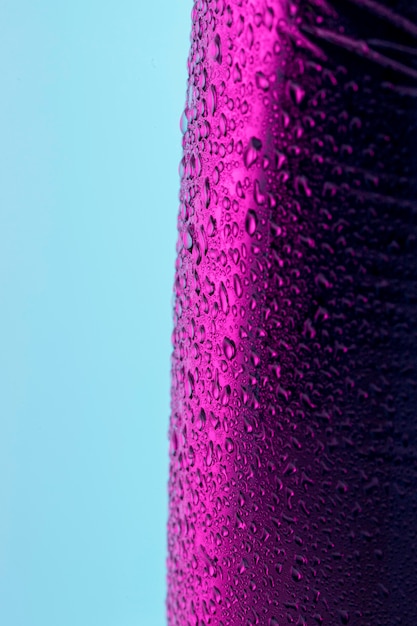Foto grátis vista frontal de gotas de líquido na superfície