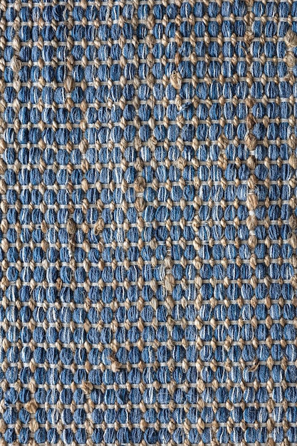 Foto grátis vista plana do conceito de textura de fundo do tapete de juta trançado de cor azul